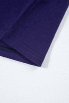 Close-up of the BETTER DAYS Top by Vivian-Lu, showcasing purple fabric and stitching detail on the sleeve.