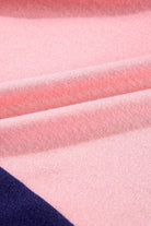 Close-up of the BETTER DAYS Top fabric by Vivian-Lu, showcasing pink color blocking and soft texture.