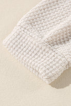 Close-up of vanilla-colored waffle knit fabric showcasing texture and soft weave of the Finally Made It top.