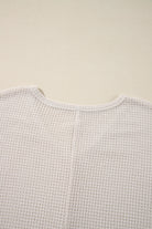 Close-up of Finally Made It Top in vanilla waffle knit fabric showing textured design and round neckline.