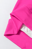 Fuchsia and white fabric detail of the Going My Way Top with bold color block design and cozy material.