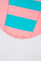 Blue and pink striped crew neck top with drop shoulder design, showcasing vibrant color block pattern for playful styling.