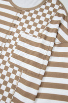 Brown and white checkered and striped top with patchwork detail and pocket, showcasing mixed patterns and vintage-inspired design.