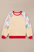 TIES THAT BIND crewneck top with colorful bows motif on sleeves and vibrant red trim, perfect for versatile styling.