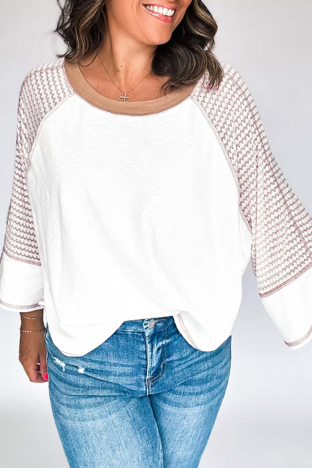 White and tan Fine Line Top with patchwork design and striped raglan sleeves, perfect for casual occasions.