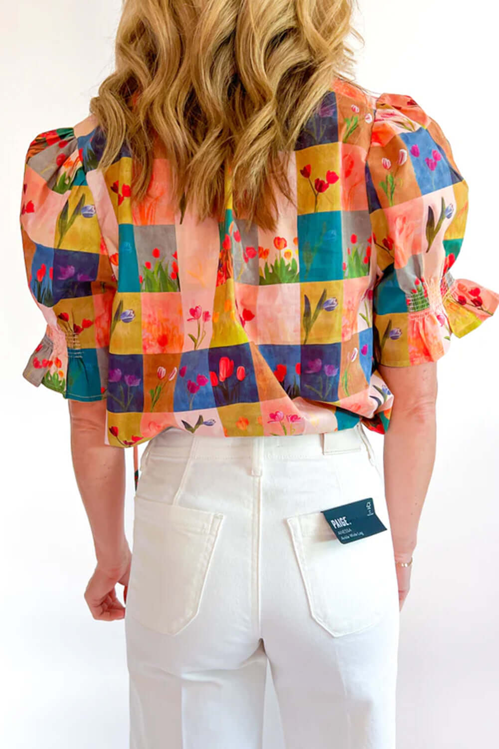 Back view of the vibrant Garden Window Top blouse featuring multicolor floral checker print.