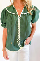 Misty green Garden Gala Top with ivory ric rac trim and short puff sleeves, showcasing a relaxed fit.