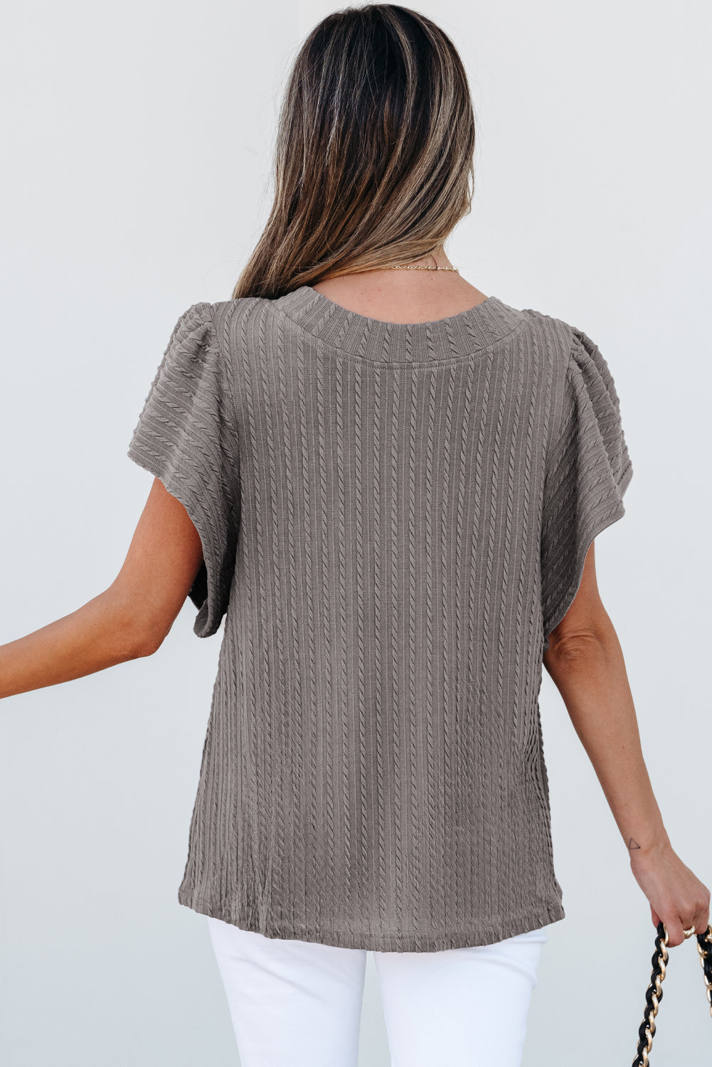 Back view of Sound Wave textured ruffle sleeve top in taupe-gray with stylish design.