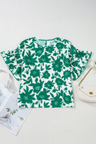 Jade Blooms Top with elegant floral print and ruffled sleeves, perfect for a feminine and versatile style.