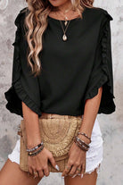 Elegant black ruffle sleeve blouse, perfect for stylish everyday wear with relaxed fit and chic design.