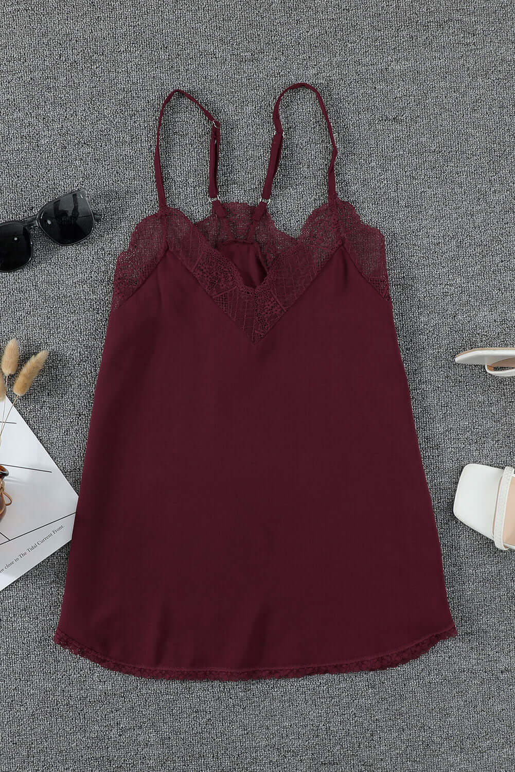 Trendy Maroon Cami - Comfort & Style | Boutique Essential by Vivian-Lu $20.00 Discover ultimate comfort and style with our IT WAS MAROON Cami. Luxurious lace, racerback design, and soft fabric make it a trendy boutique staple. Teal Tiger Boutique