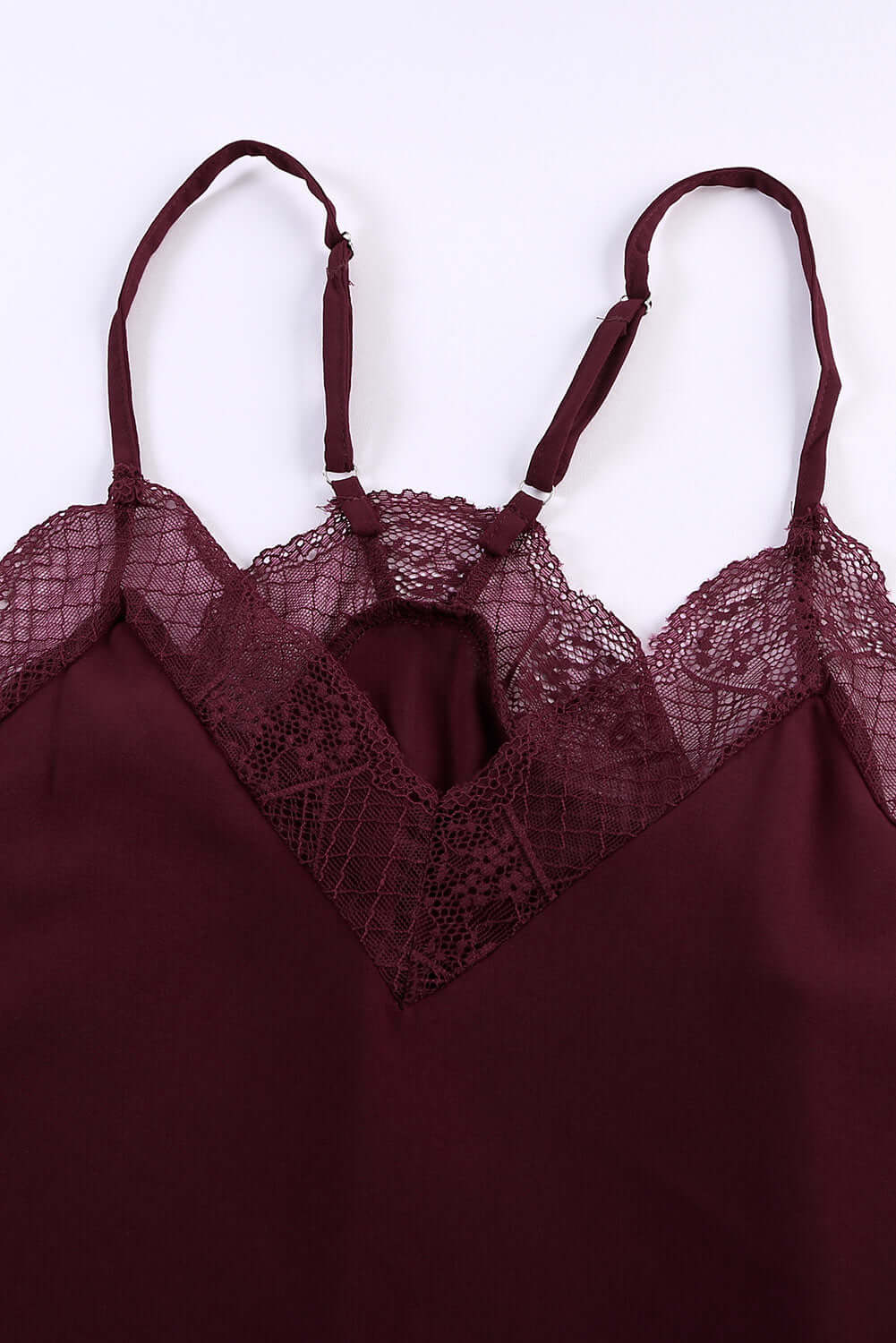 Trendy Maroon Cami - Comfort & Style | Boutique Essential by Vivian-Lu $20.00 Discover ultimate comfort and style with our IT WAS MAROON Cami. Luxurious lace, racerback design, and soft fabric make it a trendy boutique staple. Teal Tiger Boutique