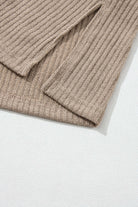 Close-up of the ribbed textured knit fabric and drop shoulder design of the UNLIMITED POTENTIAL Top by Vivian-Lu.