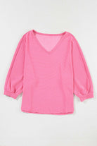 Stylish pink striped ribbed v-neck top with bracelet sleeves for casual wear by Vivian-Lu.