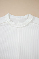Vanilla Vibe ribbed top in warm ivory featuring a textured knit and crew neckline for stylish everyday wear.