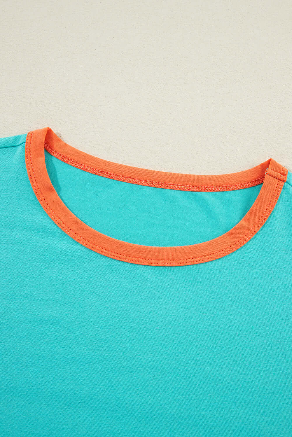 Aqua Sorbet Top Trendy, Stylish & Comfortable Boutique Wear by Vivian-Lu $26.00 Upgrade your wardrobe with our Aqua Sorbet Top. Featuring a playful color block design, relaxed fit, and stylish raw cut stitching. Perfect for trendy comfort. Teal Tiger Bout