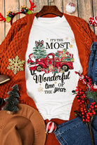 "Most Wonderful Time T-shirt with red truck and gifts, perfect for holiday spirit and layering, crew neck, festive design"