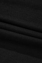 Close-up of soft black fabric with smooth texture, ideal for T-shirts and apparel.