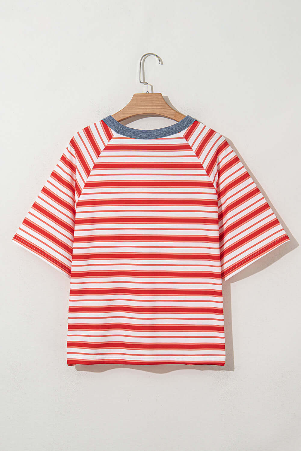 Back view of Americana Mood Top, featuring red and white stripes, blue collar, and relaxed fit for summer style.