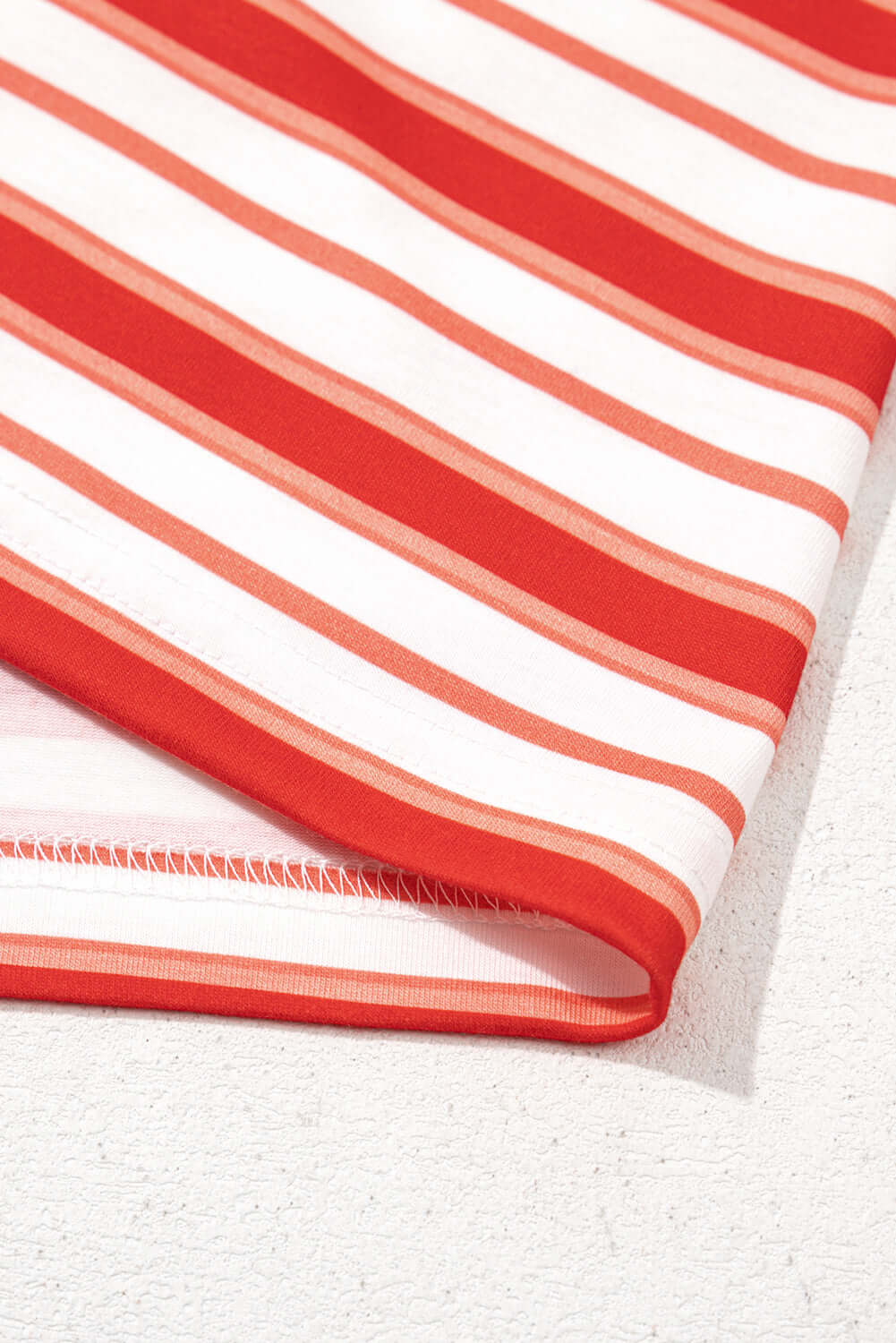 Close-up of the Americana Mood Top showcasing red and white stripes, highlighting vintage charm and relaxed fit.