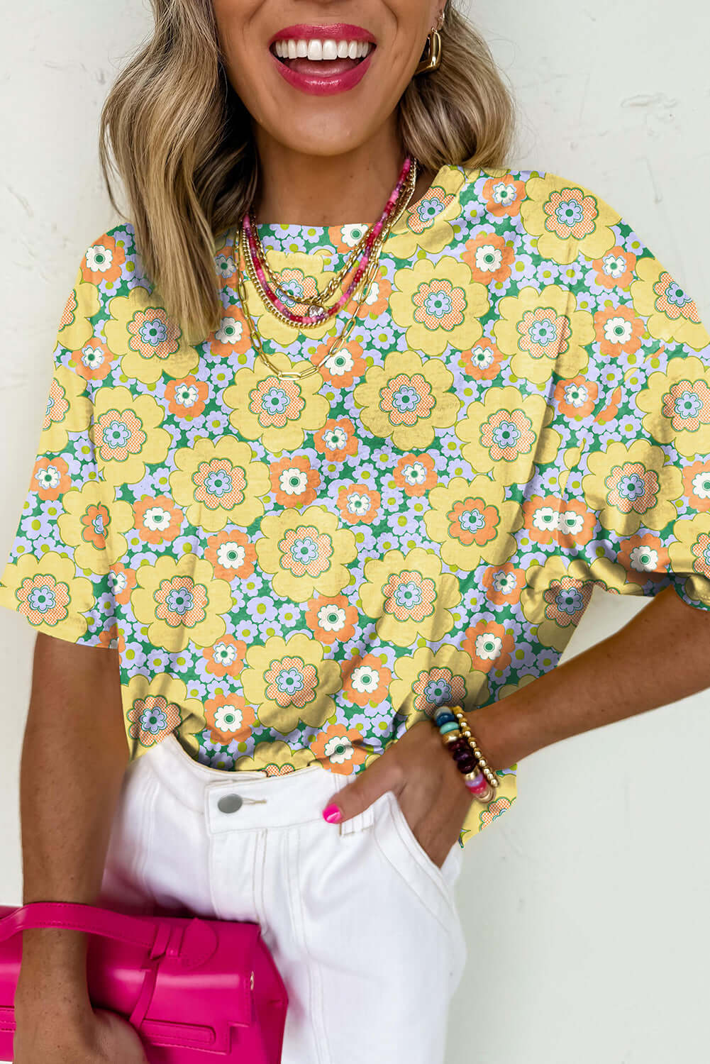 Daisy Disco Top featuring vibrant yellow floral print, perfect for summer style and laid-back vibes.