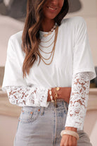 Laced Logic Top featuring white lace long sleeve inserts and layered necklaces, styled with high-waisted denim.