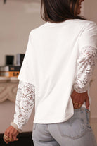 Back view of Laced Logic Top, showcasing white lace long sleeves and relaxed fit for a chic layered look.