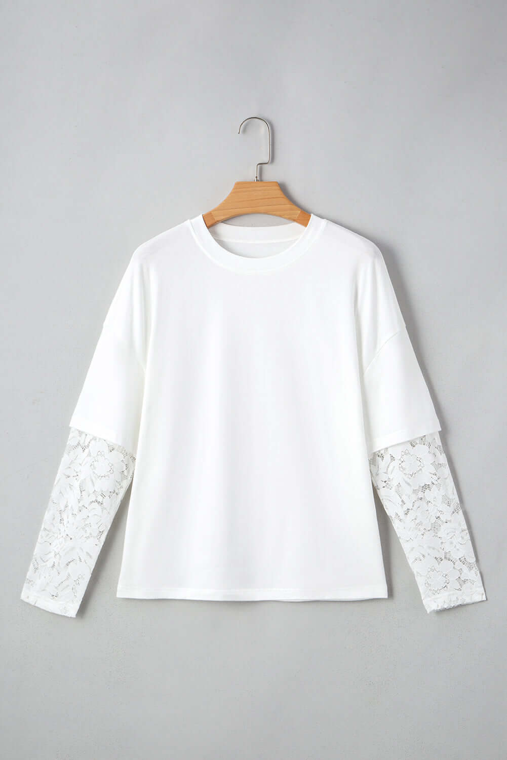Laced Logic Top featuring white lace long sleeves and drop shoulder design, perfect for a chic layered look.