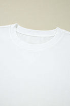 Close-up of the neckline of the Laced Logic Top showcasing its clean, minimalist white design and soft fabric.