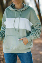 Vivian-Lu chic fleece hoodie with contrast wide band and kangaroo pocket, styled with distressed jeans.