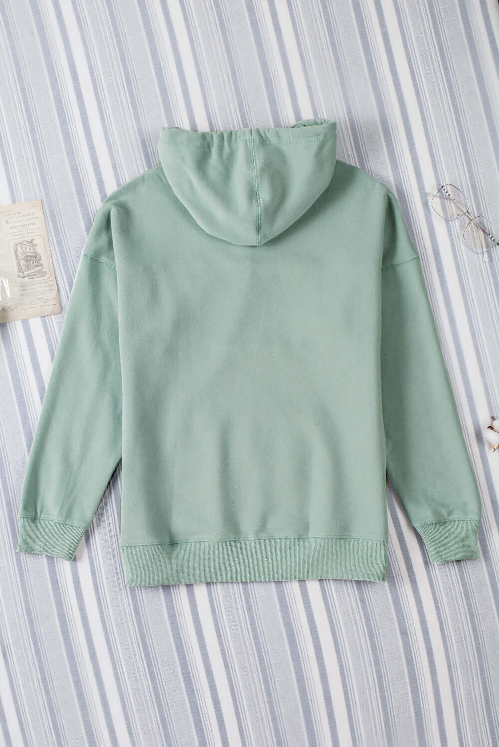 Vivian-Lu chic fleece lined green hoodie with wide band detail, perfect for stylish comfort and layering in cool weather.