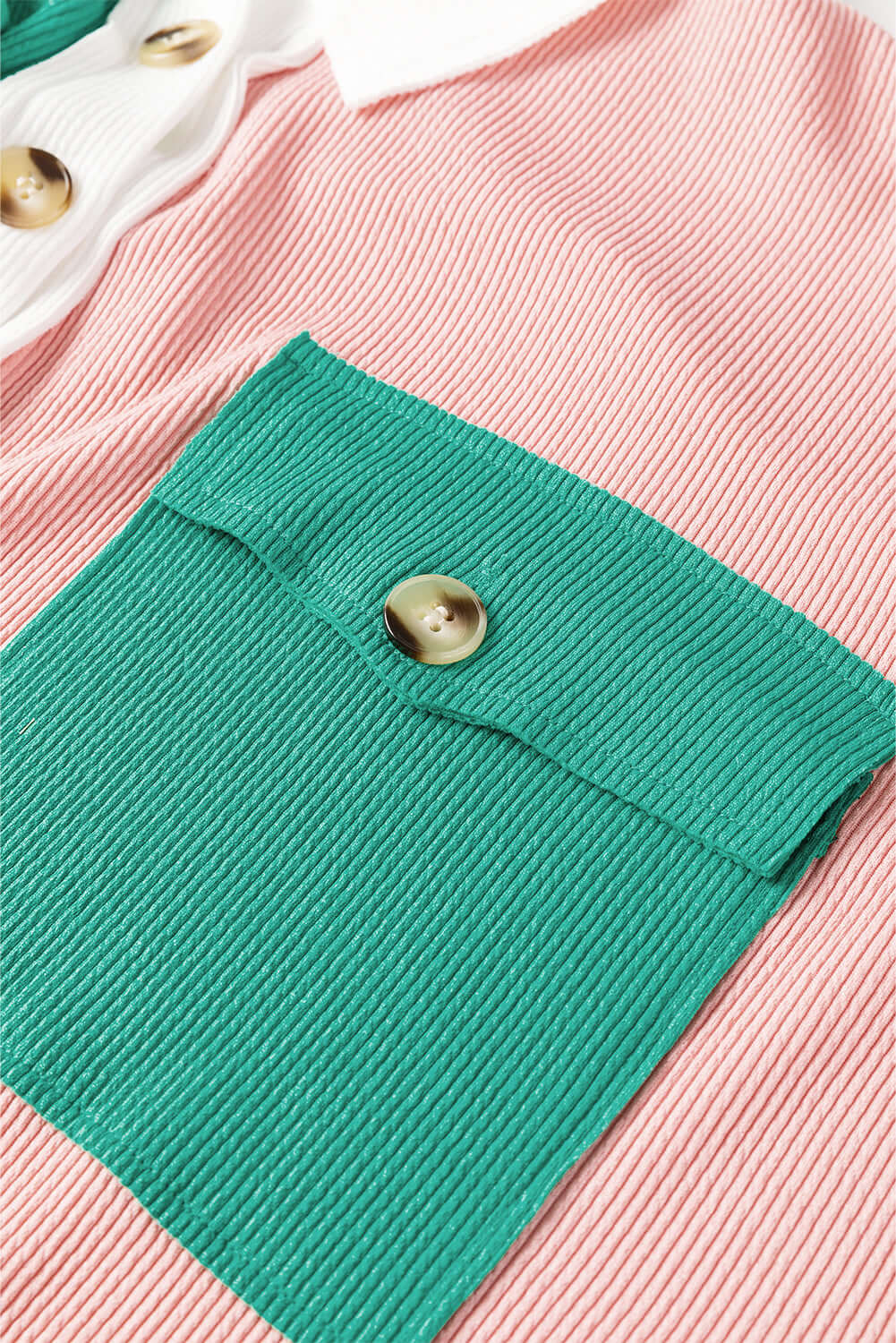 Bold Boundaries Top close-up, green pocket, white buttons, pink fabric, buttoned neckline, color block design, Vivian-Lu fashion