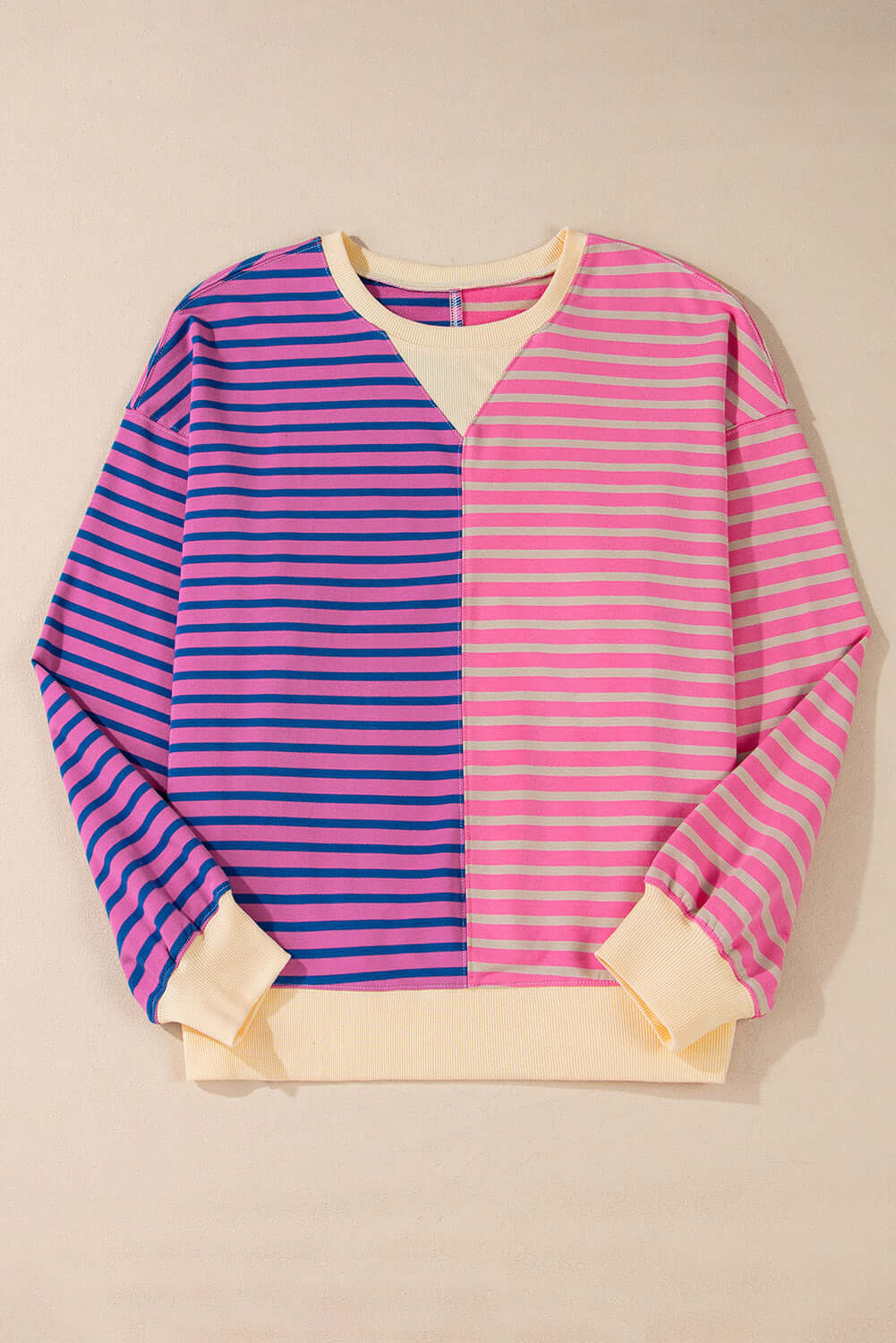 Color block oversized sweatshirt with pink and purple stripes, featuring a relaxed fit and drop shoulder design.