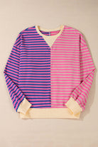 Color block oversized sweatshirt with pink and purple stripes, featuring a relaxed fit and drop shoulder design.