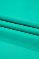 Teal fabric texture close-up of the Teal We Meet Again Crewneck sweatshirt, showcasing its sleek and structured material.