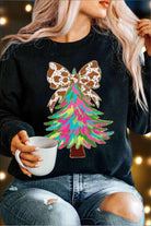 Festive sweatshirt with colorful Christmas tree and animal-print bow design, perfect for holiday style and comfort.