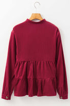 Burgundy Vivian-Lu State of Grace top with ruffle tiers and button-up design, back view on hanger.