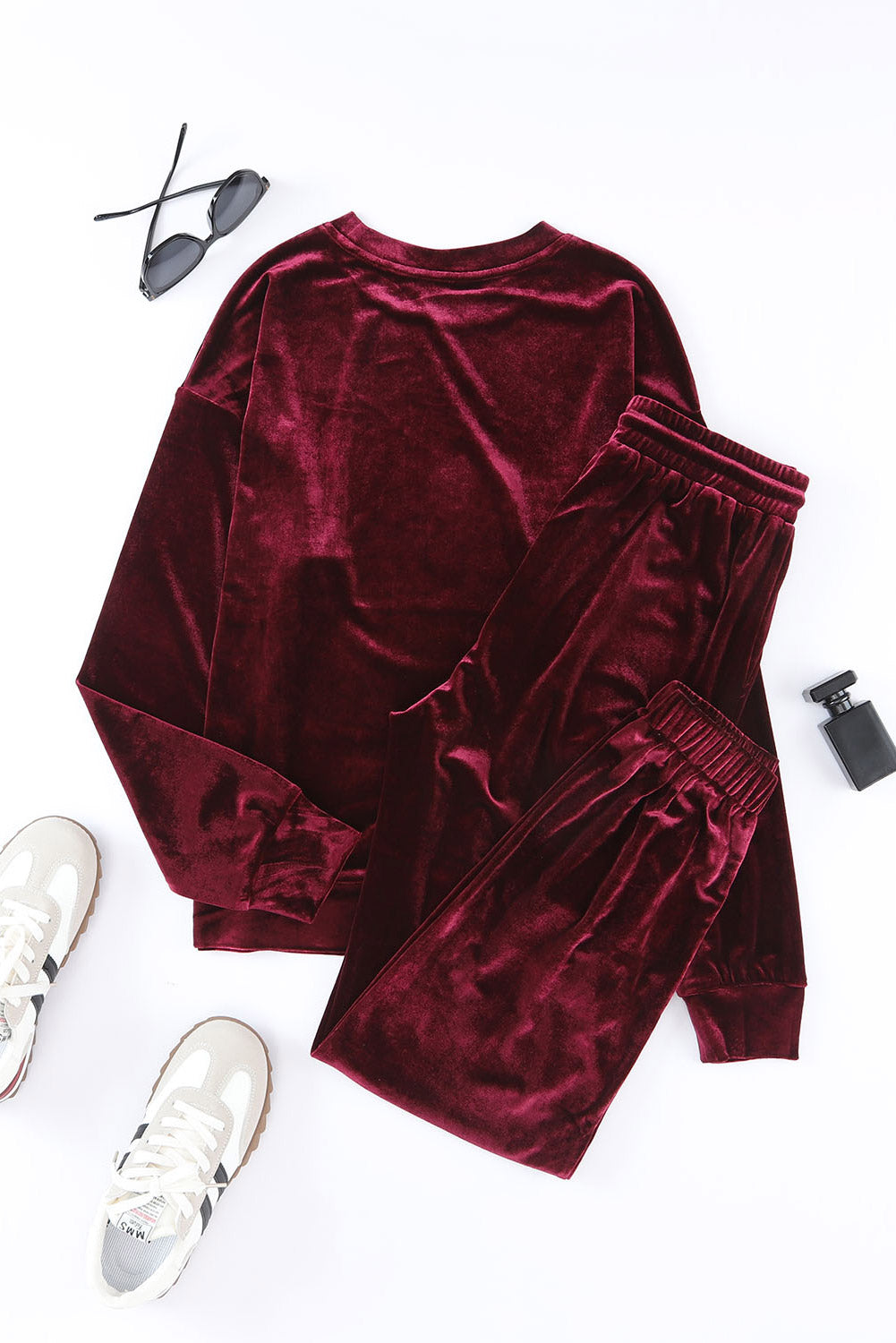 Velvet Wine 2-piece set in burgundy with long-sleeve top and drawstring pants, featuring soft material for a stylish, comfortable look.