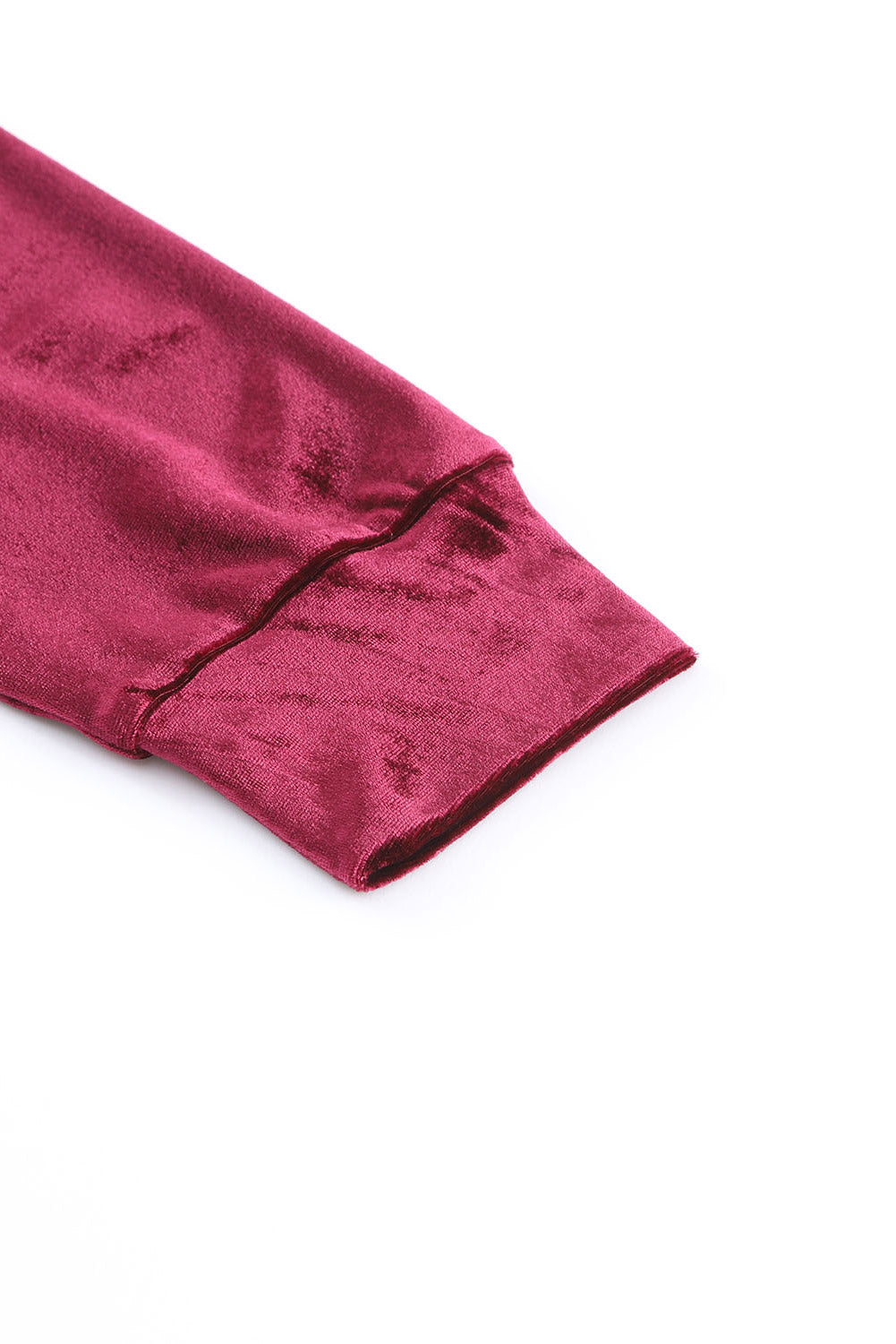 Burgundy velvet sleeve detail of the Velvet Wine Set, showcasing soft material and stylish design in a rich wine color.