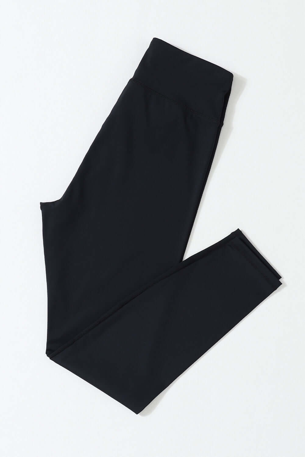 Seamless black WALK AWAY leggings by Vivian-Lu with arched waist design for tummy control and flattering fit.