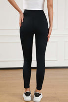 Seamless black WALK AWAY leggings by Vivian-Lu, showcasing the arched-waist design and flattering fit from the back.