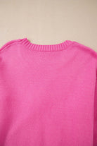 Soft pink sweater with ribbed neckline, showcasing back detail for a trendy TRIP TO REMEMBER fashion statement.