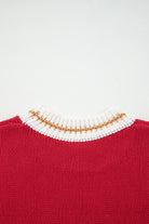 MERRY MOMENTS SWEATER with a cozy fiery red knit and festive white and gold ribbed neckline for the holiday season.