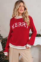 MERRY MOMENTS SWEATER in fiery red with bold MERRY graphic, featuring a relaxed drop shoulder fit and festive style.