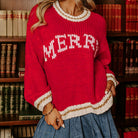 MERRY MOMENTS SWEATER featuring bold MERRY graphic in red color block, perfect for holiday celebrations.