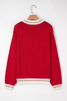 Back view of the MERRY MOMENTS SWEATER in fiery red with color block trim and drop shoulder design.