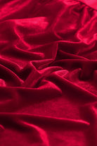 Luxurious red berry crinkled velvet fabric texture of VIBRANT VELVET Dress by Vivian-Lu, showcasing elegance and sophistication.