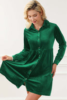 Elegant evergreen velvet dress by Vivian-Lu with collared neck and buttons, showcasing style and comfort in vivid velvet fabric.