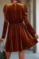 Elegant chestnut brown velvet dress with gigot sleeves and gathered waist from Vivian-Lu, showcasing sophisticated style.