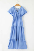 Dreamfield Days maxi dress in serene sky blue with flutter sleeves and V-neckline, perfect for summer outings.